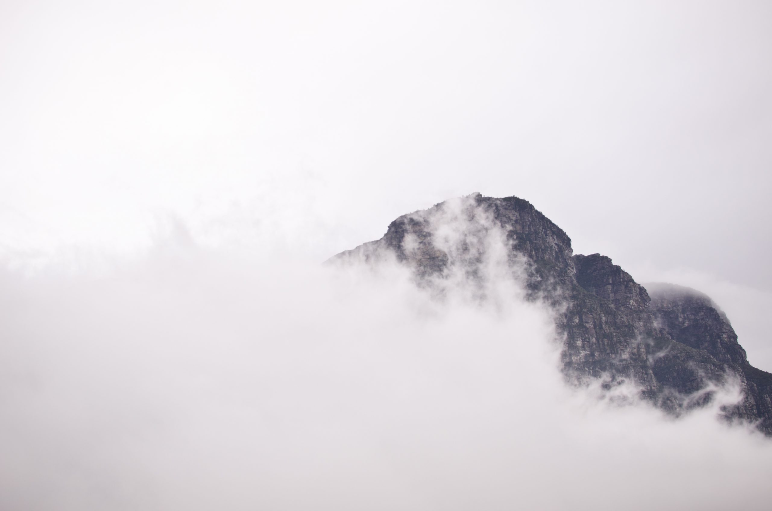 photo; cloudy mountain range.